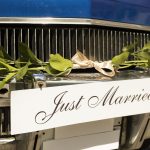 just-married-car-scene-with-beautiful-flowers